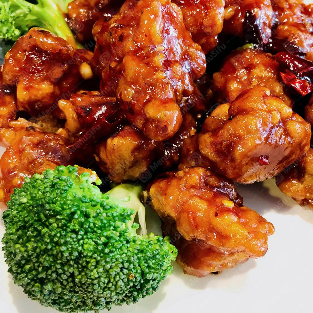 General Tso’s chicken with broccoli in spicy sweet glaze at Chinese Wok, a Chinese Restaurant in Seymour